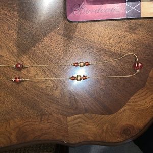 Long Vintage gold tone necklace orange gold trim